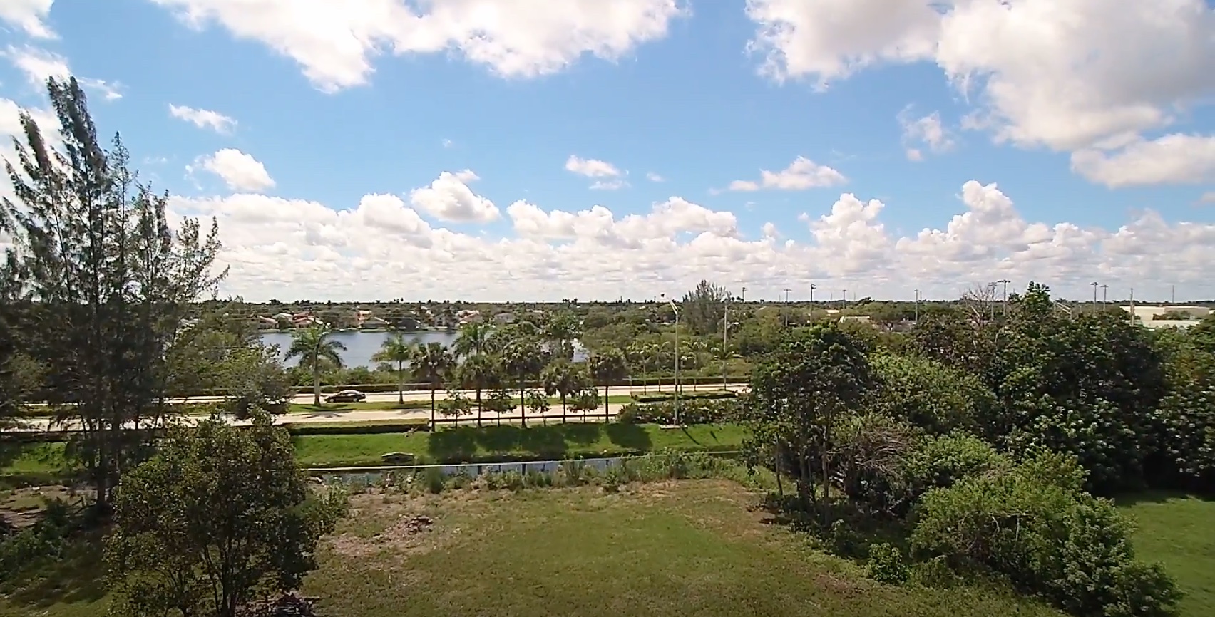 Green space, lakes and tree cover along Sheridan Street in Southwest Ranches